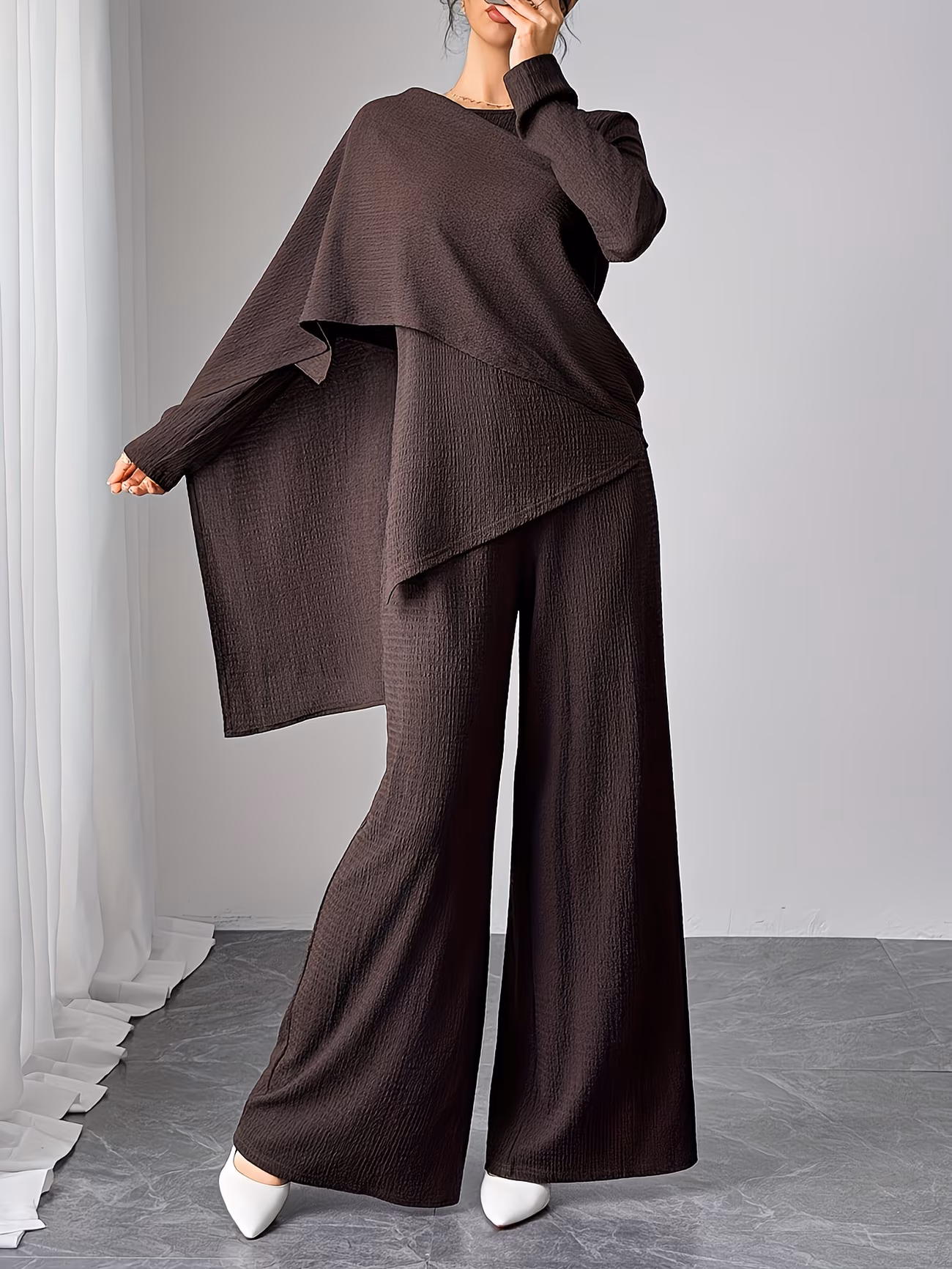 Tunic top paired with wide-leg pants